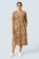 FlowVibe™ - V - udskæring, korte ærmer, A - formet mønstret kjole med sidelommer - Azora