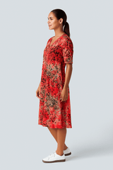 FlowVibe™ - V - udskæring, korte ærmer, A - formet mønstret kjole med sidelommer - Azora